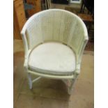 A bamboo effect cream chair