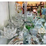 A glass swan and other glass