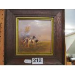 A Crown Devon porcelain plaque two dogs, signed R. Hinton