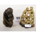 A small bronze monkey and a soapstone carving balancing monkeys