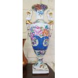 A floral decorated vase with sphinx handles and two pairs French porcelain door plates