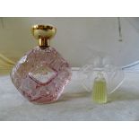 A Lalique scent bottle 2009 and a small Lalique scent bottle 2004 with plastic stopper of nude