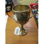 A silver trophy cup and two pairs silver napkin rings (i.c)