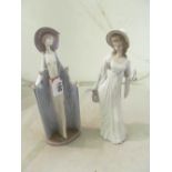 A tall Lladro lady in long dress (thumb a/f) and another tall Lladro lady in white dress