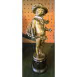 A bronze figure semi-nude boy with hat