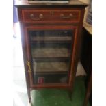 An Edwardian mahogany music cabinet with drawer