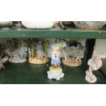 Various 19th Century and other porcelain figures, encrusted floral china basket supported by cherubs