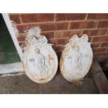 Two oval garden plaques classical ladies
