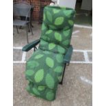 Two garden reclining chairs and cushions