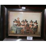 A framed tile picture of 16th Century Reformation gentlemen seated around table in rosewood effect