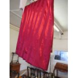 A curtain red fabric, lined and interlined 240 cms wide x 215 cms drop