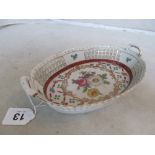 A Porcelaine Royale pierced edge dish decorated flowers