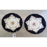 A pair of Copeland plates central rose design 5879