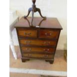 A small mahogany chest of two short and three long drawers