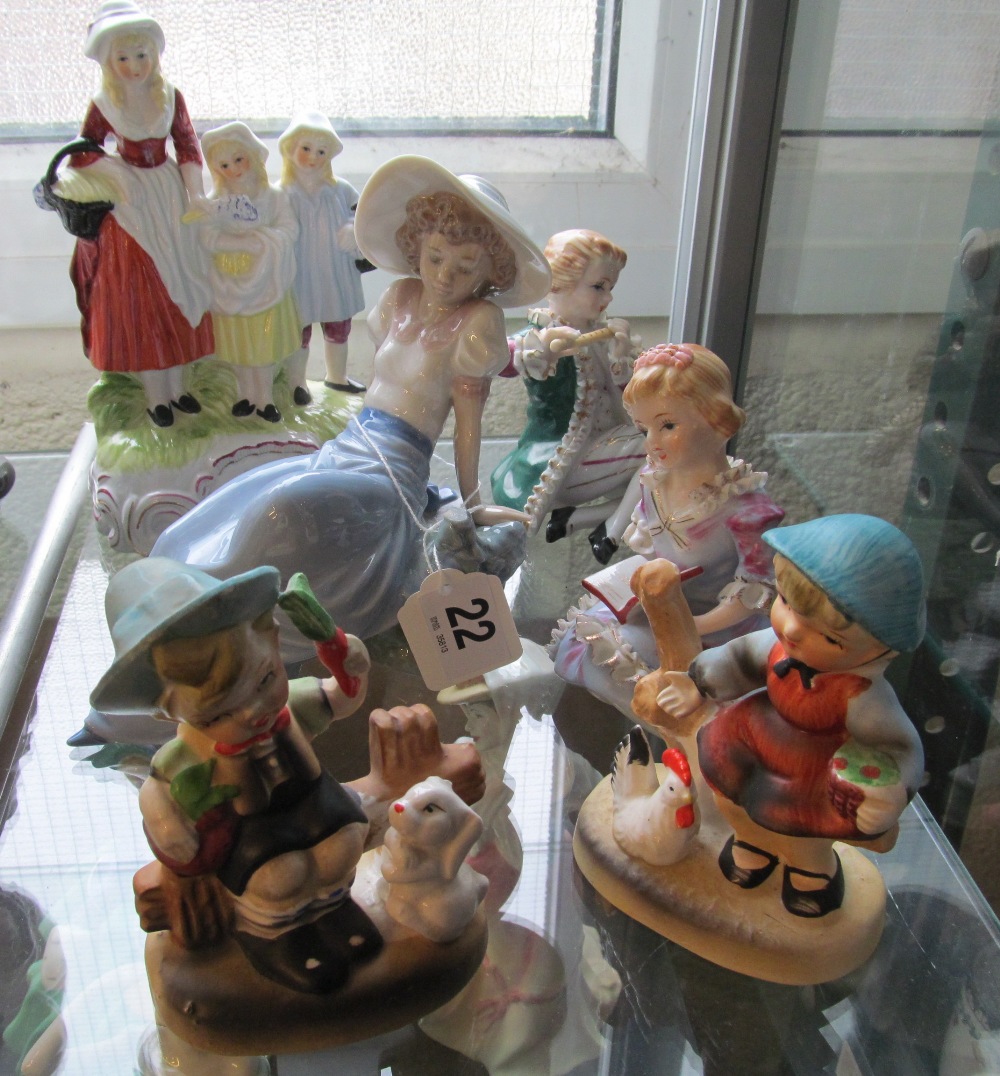 A Nao girl in bonnet (a/f) and other figures