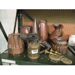 Two copper jelly moulds and copper/brass items