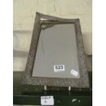 A silver plated framed mirror floral design (s/a/f).