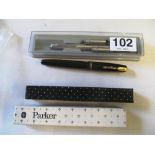 A vintage Parker 35 fountain pen with 14k nib in original box, two Parker stainless steel scew-in