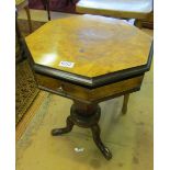 A Victorian walnut trumpet work table