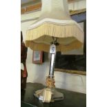 A chrome table lamp