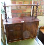 A mahogany wall cabinet