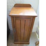 A pair bedroom chairs and a bedside cabinet