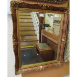 A walnut and gilt framed mirror