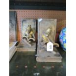 A pair of gilt resin bookends monkey reading books