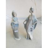 A Lladro figure holding lilies (slightly a/f), Lladro elegant lady and a Nao lady holding flower