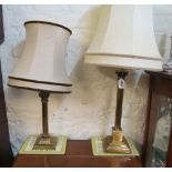 Two brass table lamps and shades