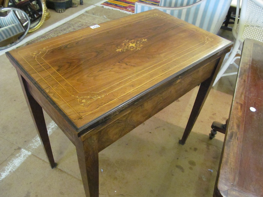 A late Victorian rosewood games/work table with a foldover top revealing backgammon, chess and - Image 5 of 5