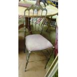 A pair of gilt ballroom chairs