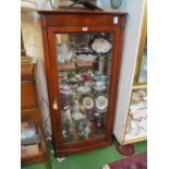 A modern bow front display cabinet