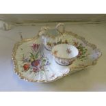 A German porcelain two division dish with Dresden saucer and jug (a/f) to centre