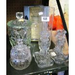 A glass vase and other glass items