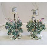 A pair Bow tree ornaments, birds in branches protecting nest of fledglings, handles to rear and