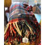 A tartan wool blanket