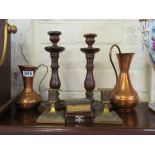 Two oak candlesticks, two brass boxes and two copper jugs