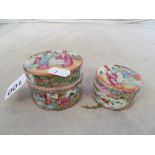 A 19th Century Cantonese famille rose lidded box and two circular lidded boxes