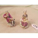 A pair porcelain figures gallant and lady seated on chairs