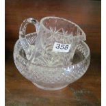 A cut lead crystal water jug and fruit bowl