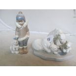 A Lladro polar bear group and an eskimo with polar bear