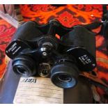 An Olympus camera, flash and Lane & Dolland 8 x 30 binoculars