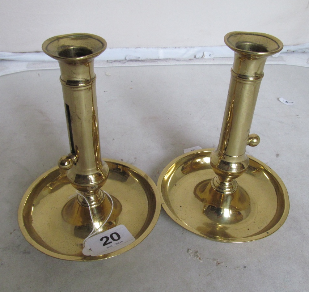 A pair of Victorian candlesticks with push-ups