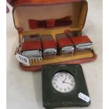 A gentlemen's grooming kit and clock