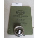 A car clock and some manuals for Arab