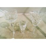 A selection of Waterford Crystal glasses; three hock glasses, four tapered wines and a liquer glass