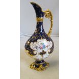 A Royal Crown Derby ewer blue and gilt ground with handpainted reserves of flowers circa 1900