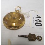 An 18ct gold pocket watch with engraved back and gilt engraved face