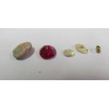 A loose opal and other stones